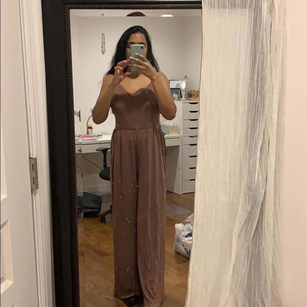 New with tags never worn purple jumpsuit